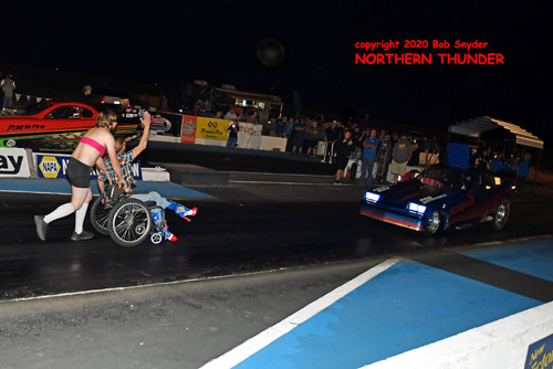 (near lane) Justin Herbst - 'Scorpion' (with backup crew) vs (far lane) Nick Johnson - 'Prairie Fire'